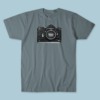 Showcase your love for classic photography with this stylish t-shirt featuring a vintage Nikon F camera, the quintessential 35mm film icon.